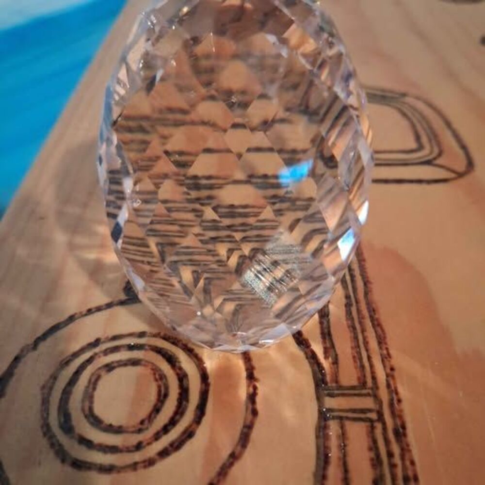 Faceted Clear Oval Swarovski crystal egg paperweight.